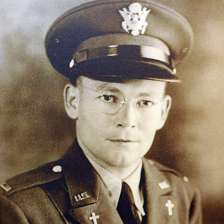 Who converted 200 Americans in a POW camp?