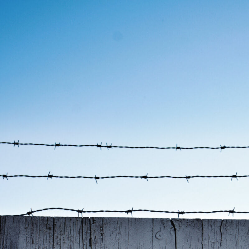 How did John Paul II help bring down the Berlin Wall?