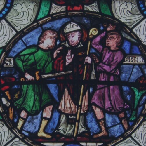 Who was killed at the altar defending the name of Jesus?