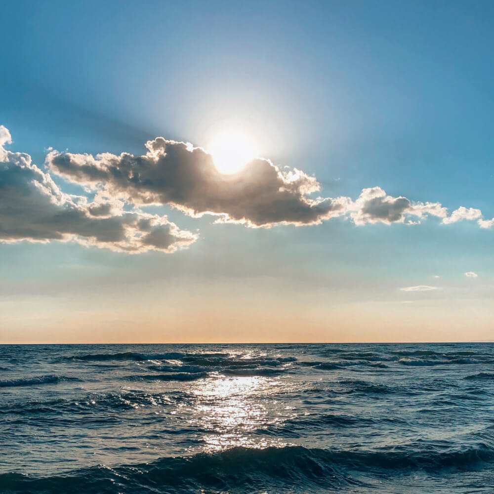 Which saint is portrayed with broken chains on her wrists?