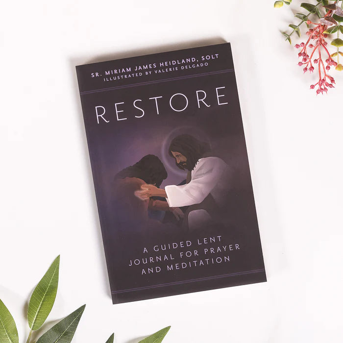 Cover of the book ‘Restore: A Guided Lent Journal for Prayer and Meditation,’ featuring an illustration of Jesus comforting a kneeling person on a dark background.