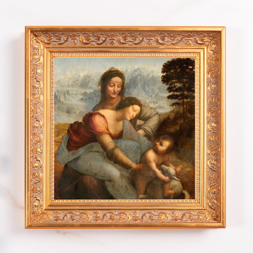 Framed "The Virgin and Child with Saint Anne" print in ornate gold frame.