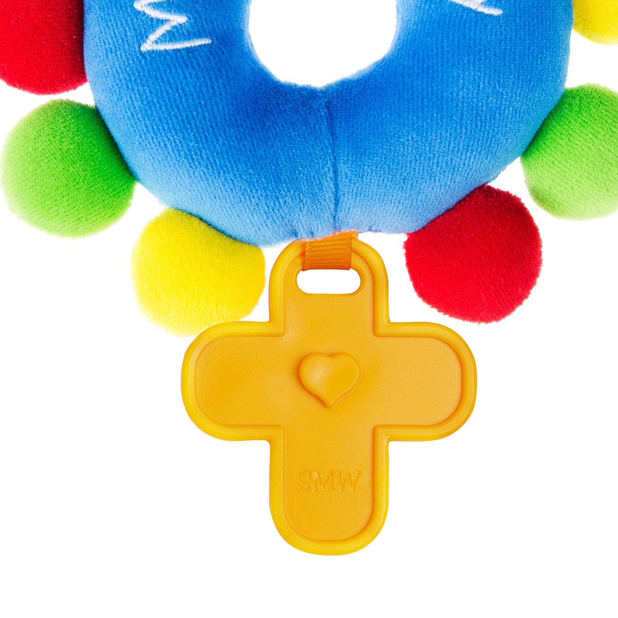 Teether toy: Blue plush circle with colorful balls, and a yellow plastic cross teether with a heart shape.