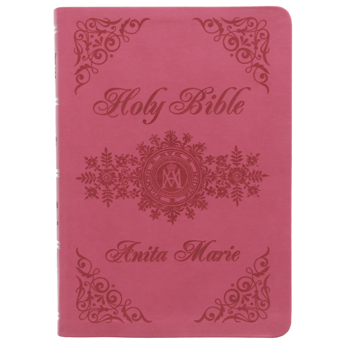 Pink, faux leather Holy Bible with floral accents and a custom name imprint in elegant script font.