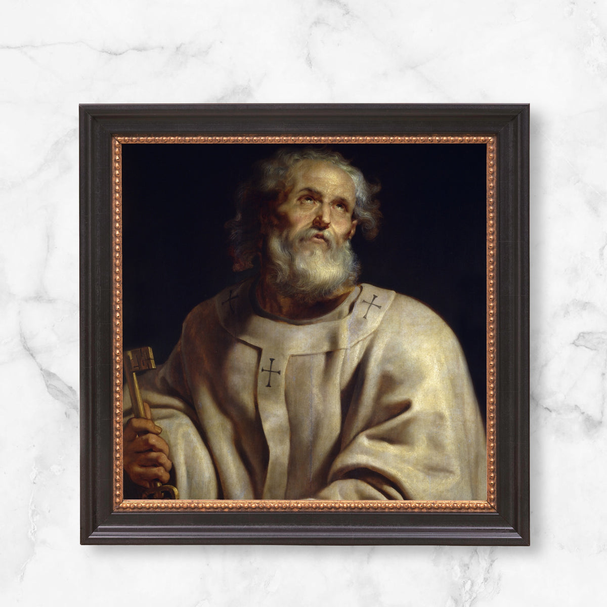 Framed art depicting a biblical figure in a tunic with crosses, holding keys in a dark wood frame.