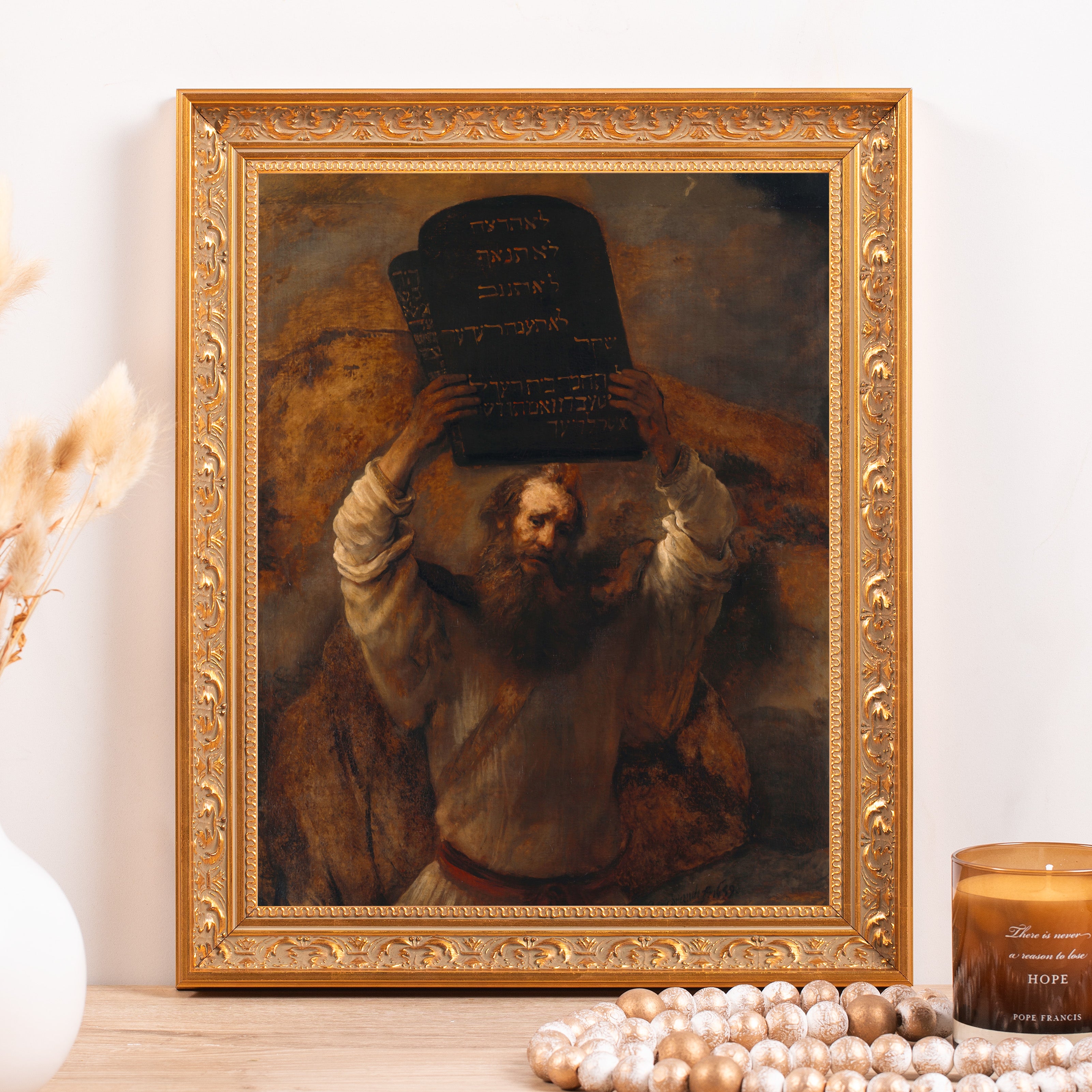Framed Moses artwork showing Ten Commandments, with gold carved frame and ornate details, classic style for religious art prints.