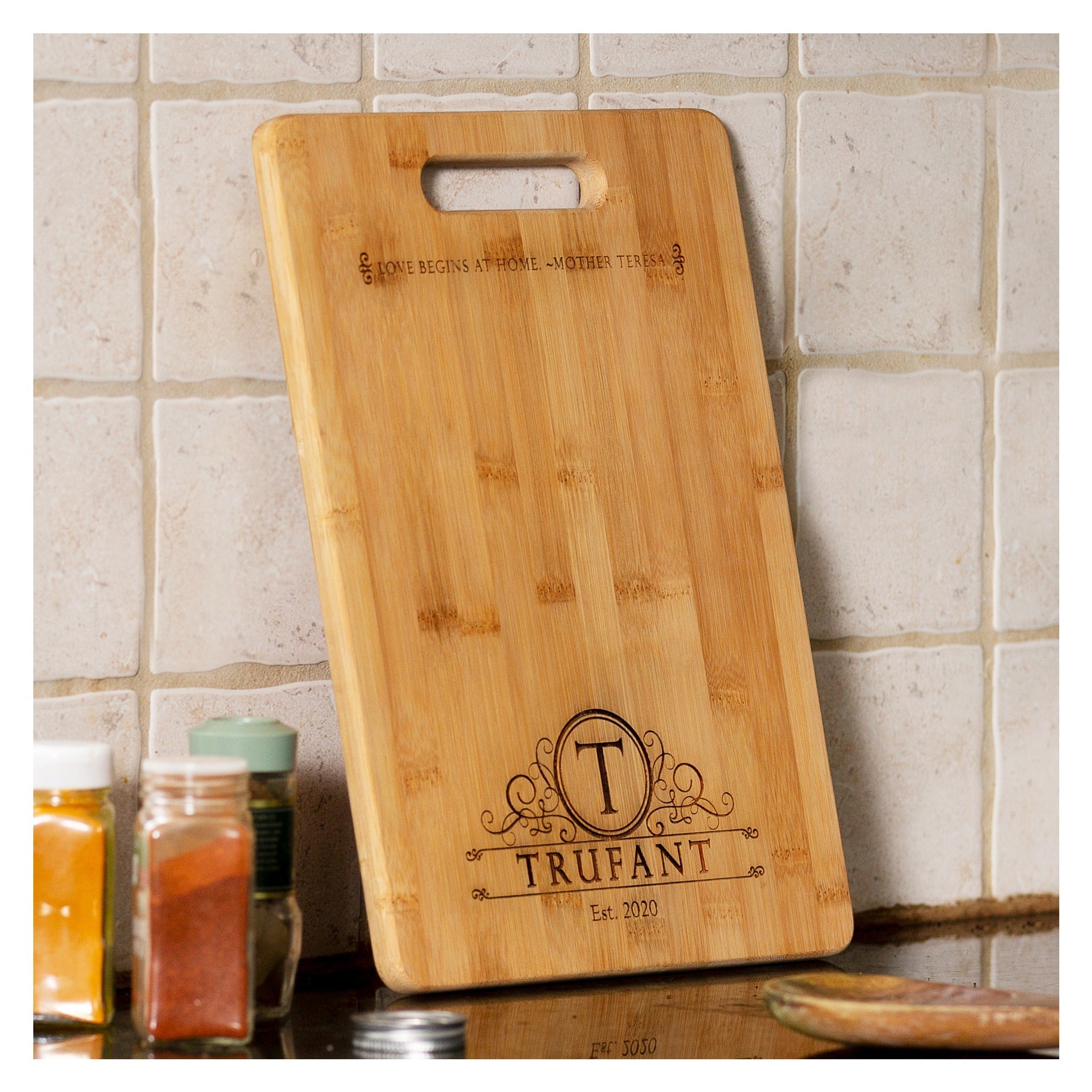 Love Begins at Home Cutting Board
