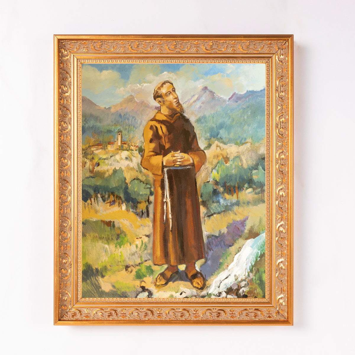 Framed oil painting of a brown-robed monk in a landscape, ornate gold frame, traditional style.