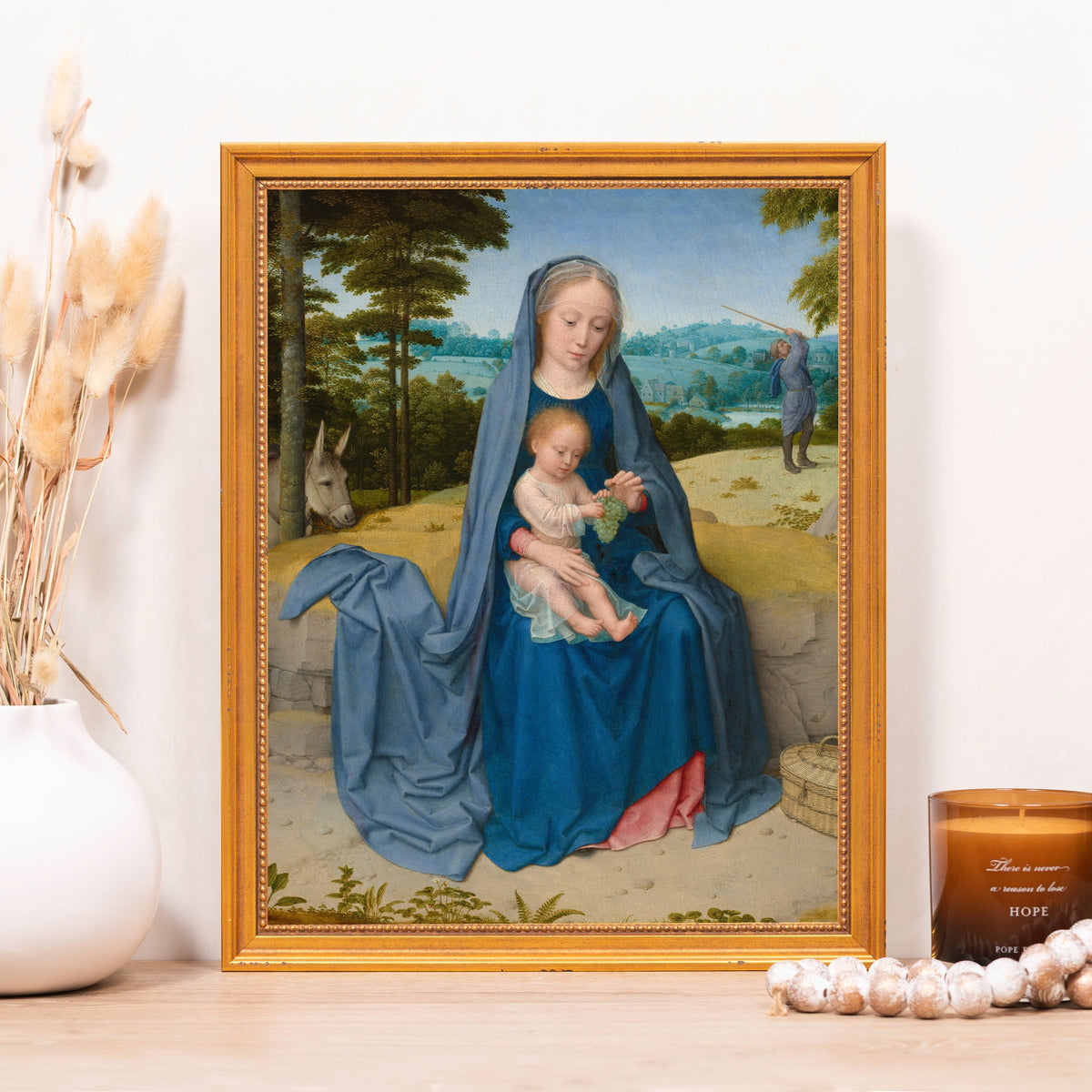 Framed art print featuring Mary and Baby Jesus in blue robes, golden frame, classical style.