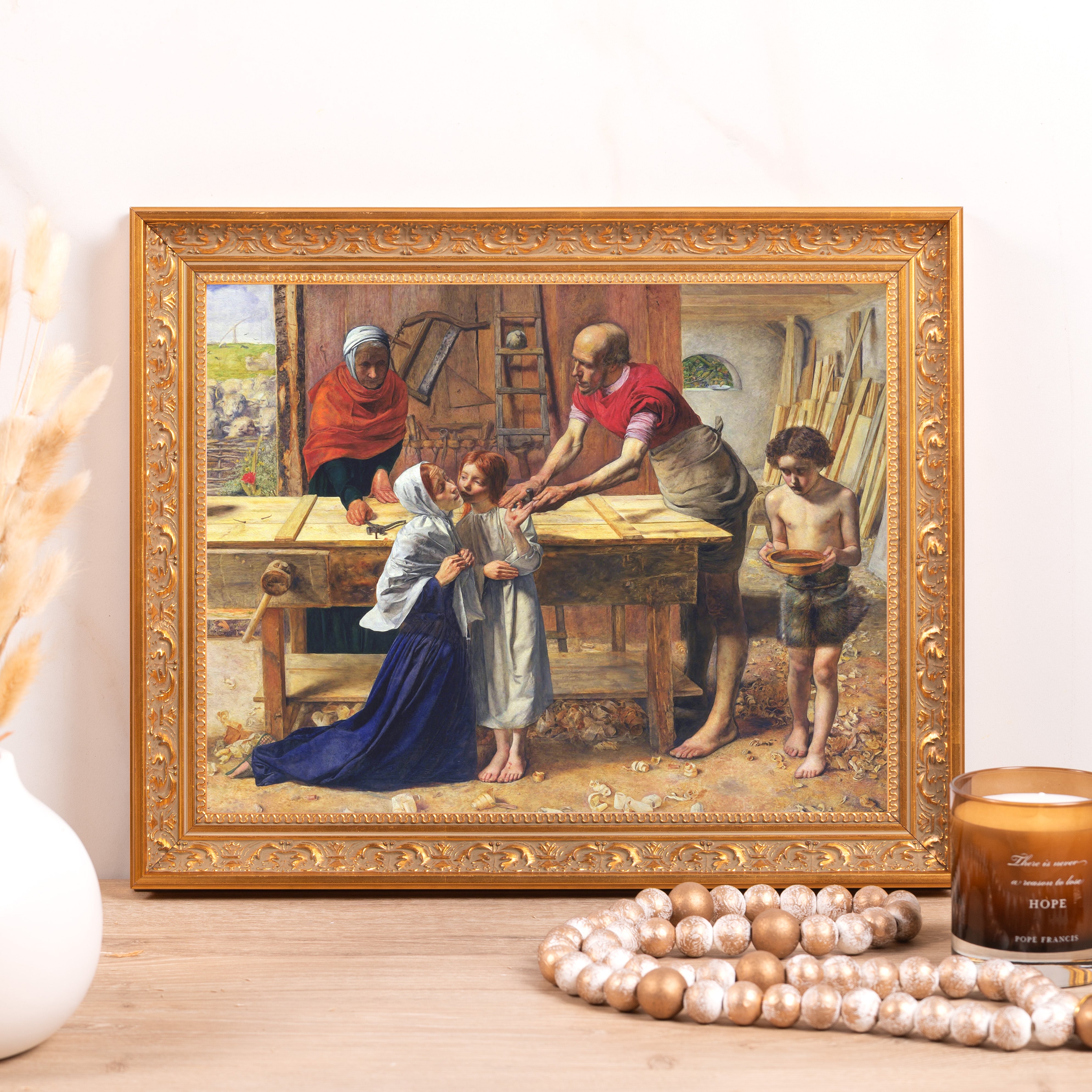 Framed art print depicting carpentry work, ornate gold frame.