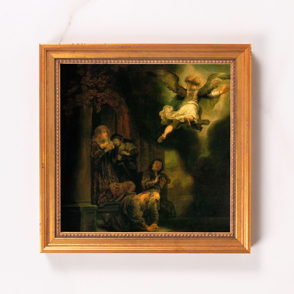 Framed reproduction of religious oil painting showing angel hovering over people, gold frame.
