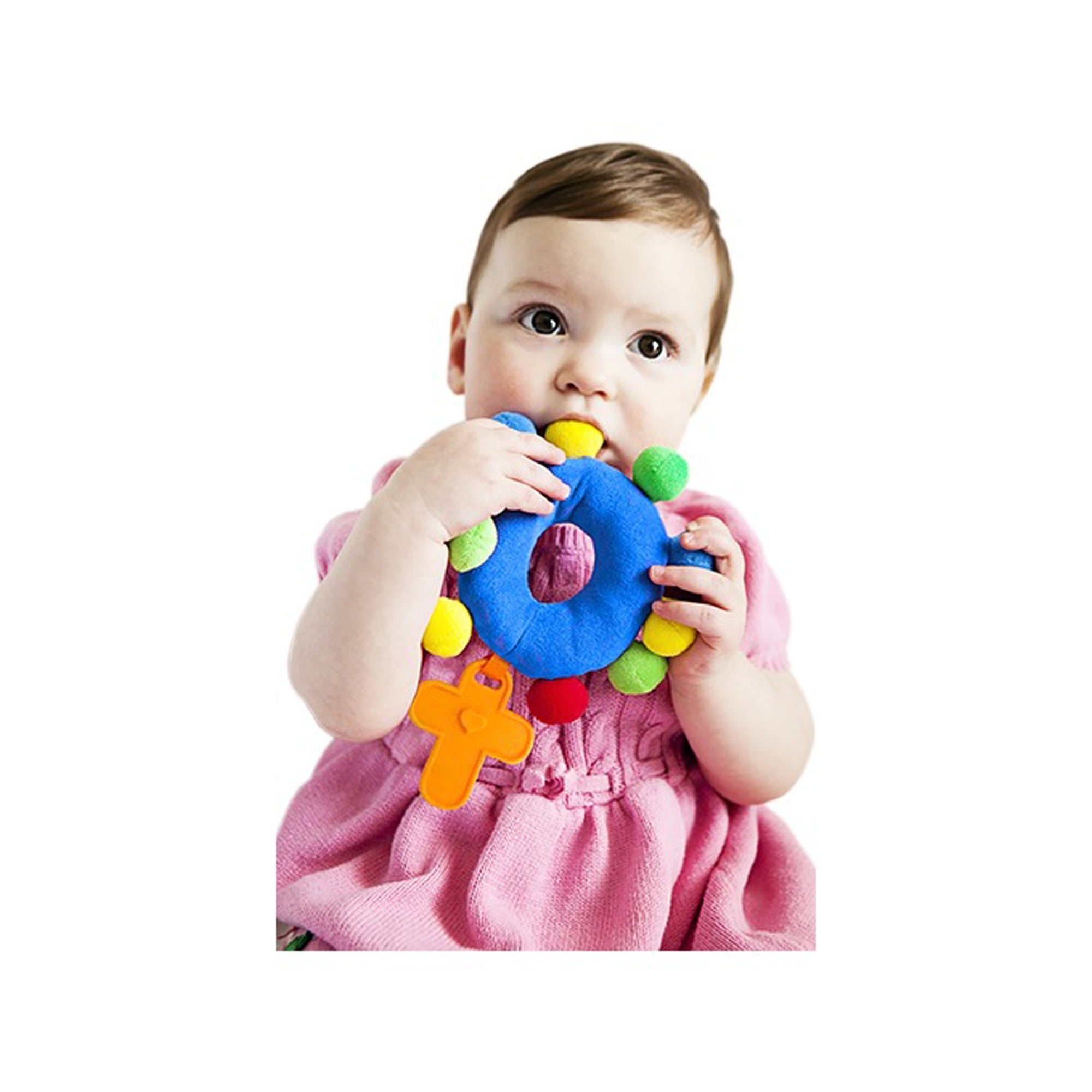 Baby is chewing blue, donut-shaped fabric teething toy with colorful plush balls and attached cross-shape teether.