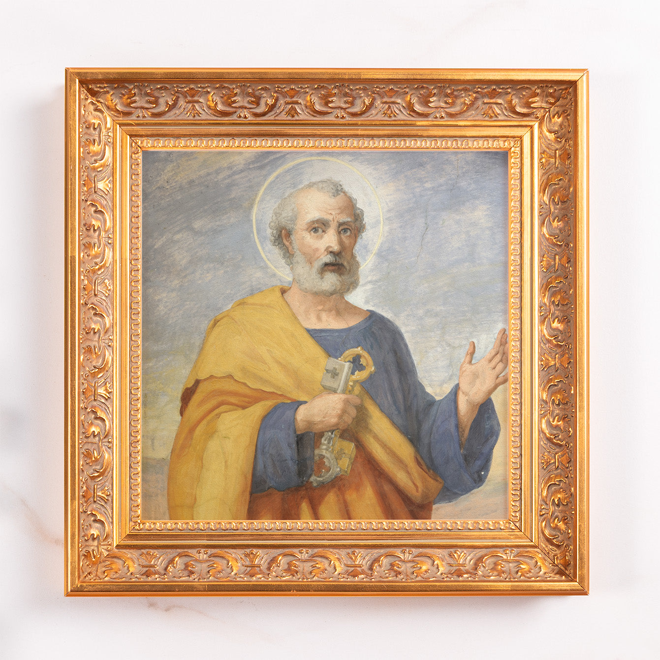 Framed oil painting of Saint Peter holding keys in a gold frame.