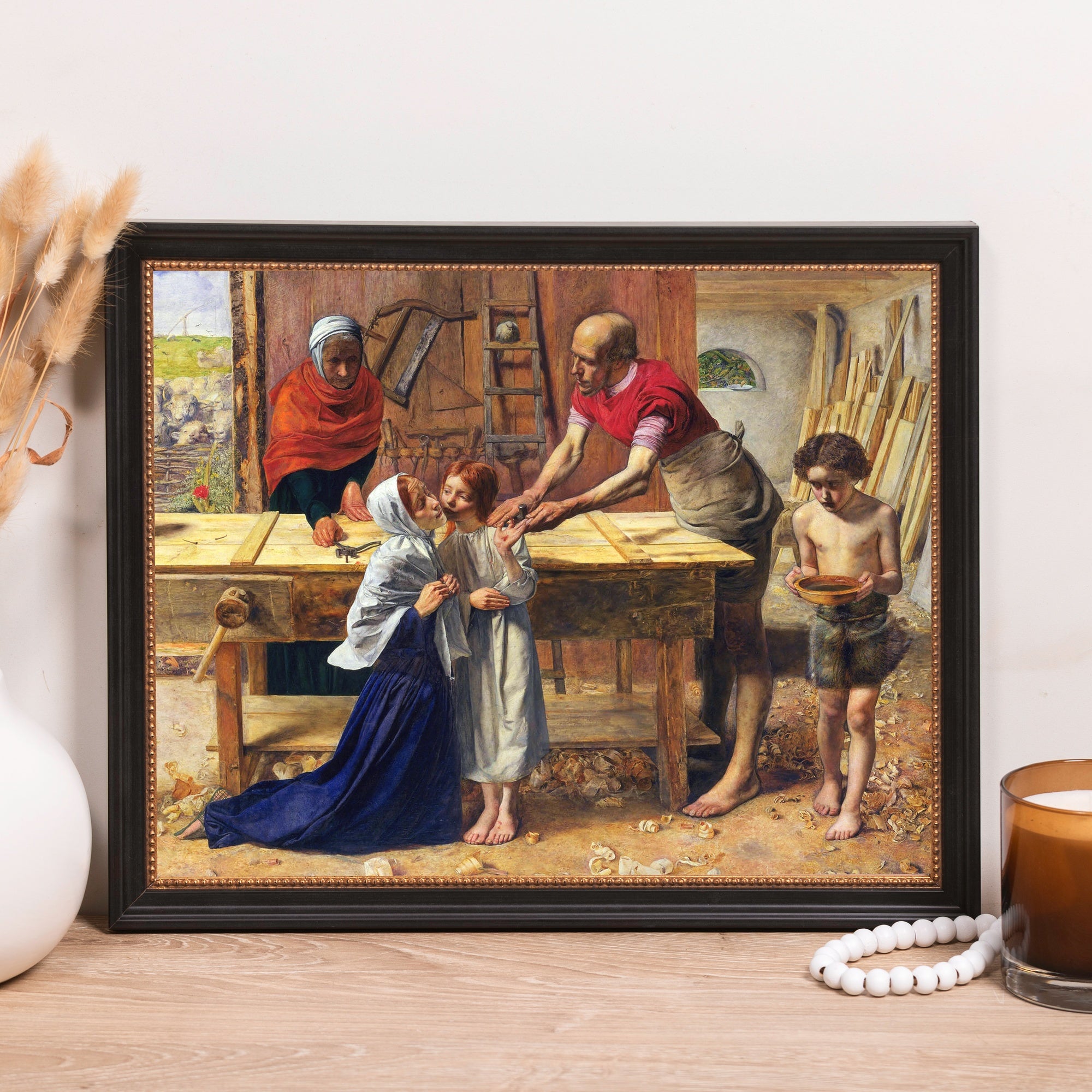 Framed "Christ in the House of His Parents" painting in a black frame for wall decor, depicting Jesus as a boy.