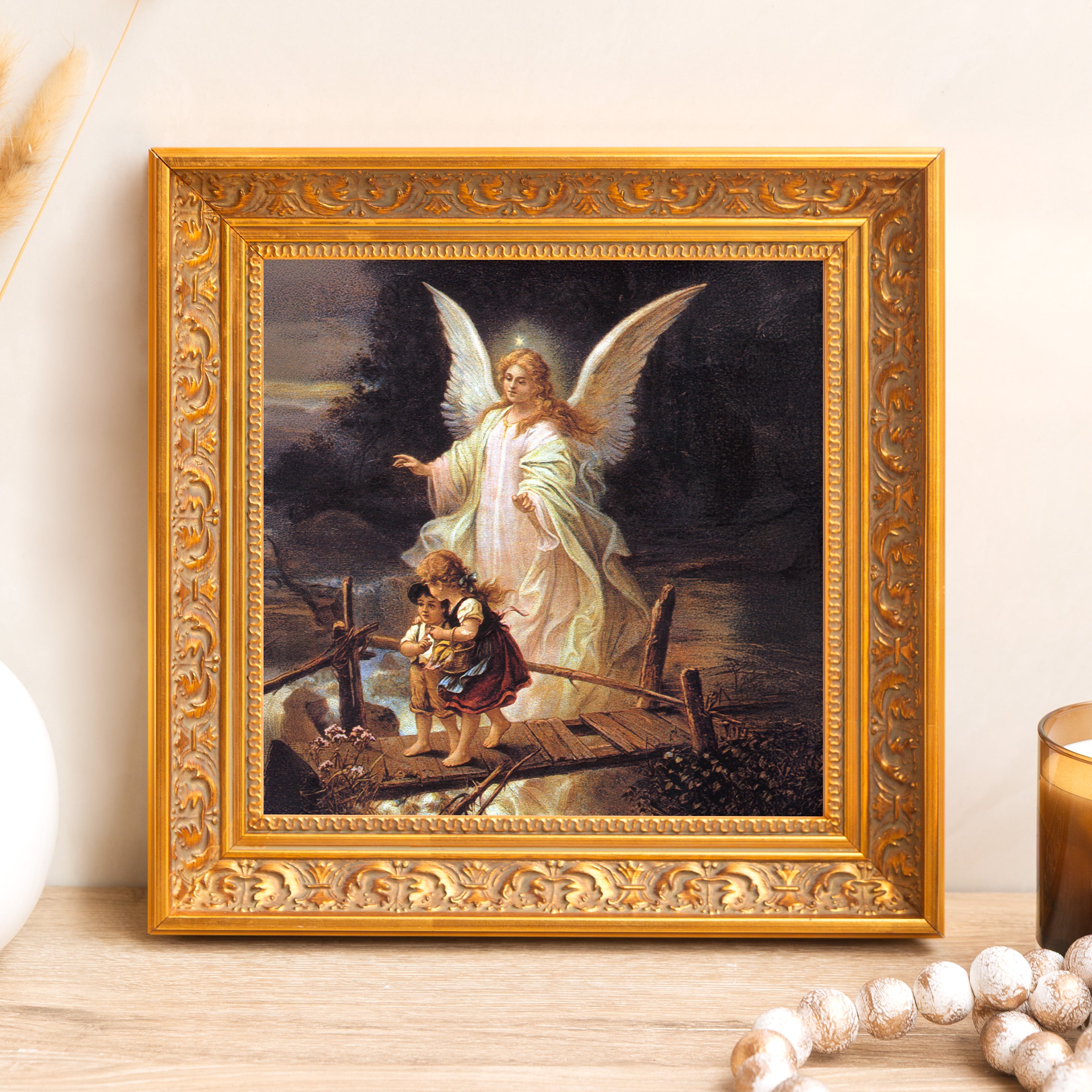 Framed print depicts angel guiding children, ornate gold frame, vintage style.