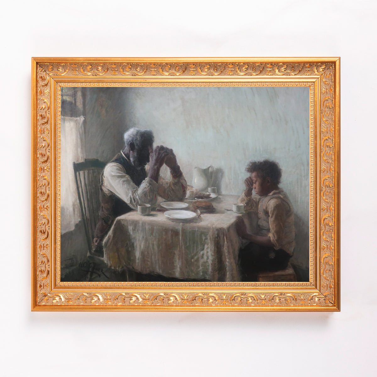 Painting of man and child praying before meal, framed in gold carved wood, vintage style.