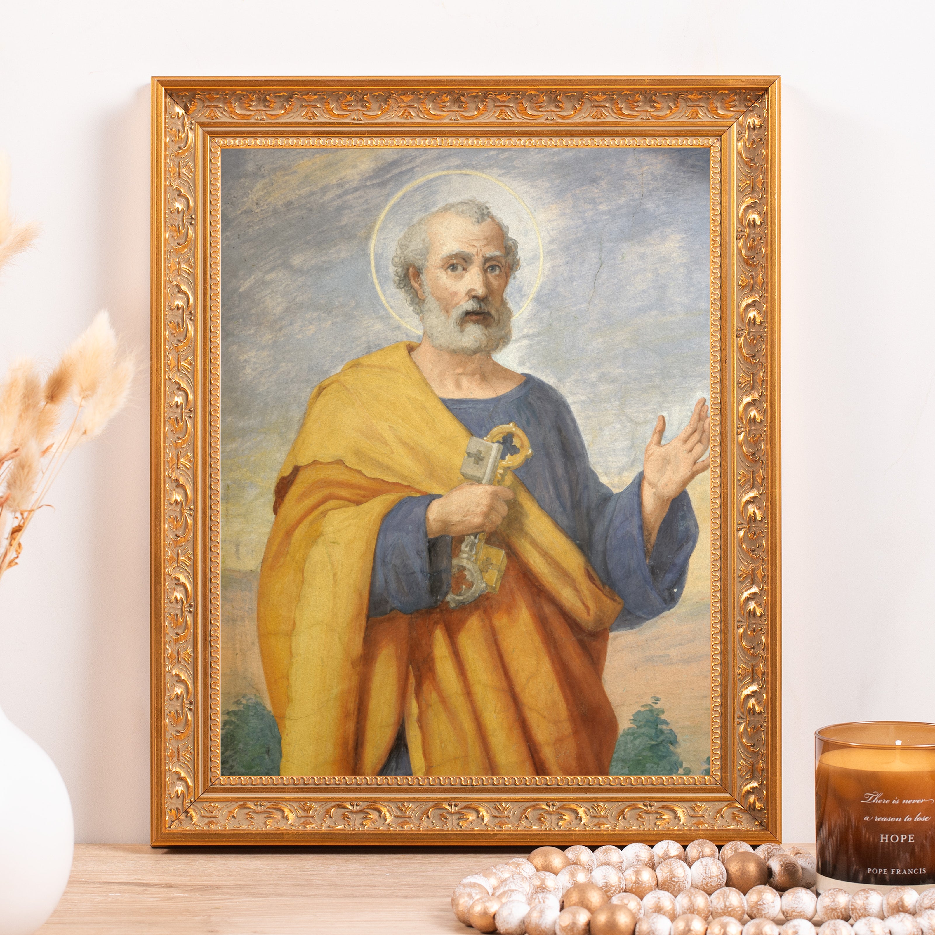 Framed portrait of Saint Peter holding keys in a detailed gold frame.