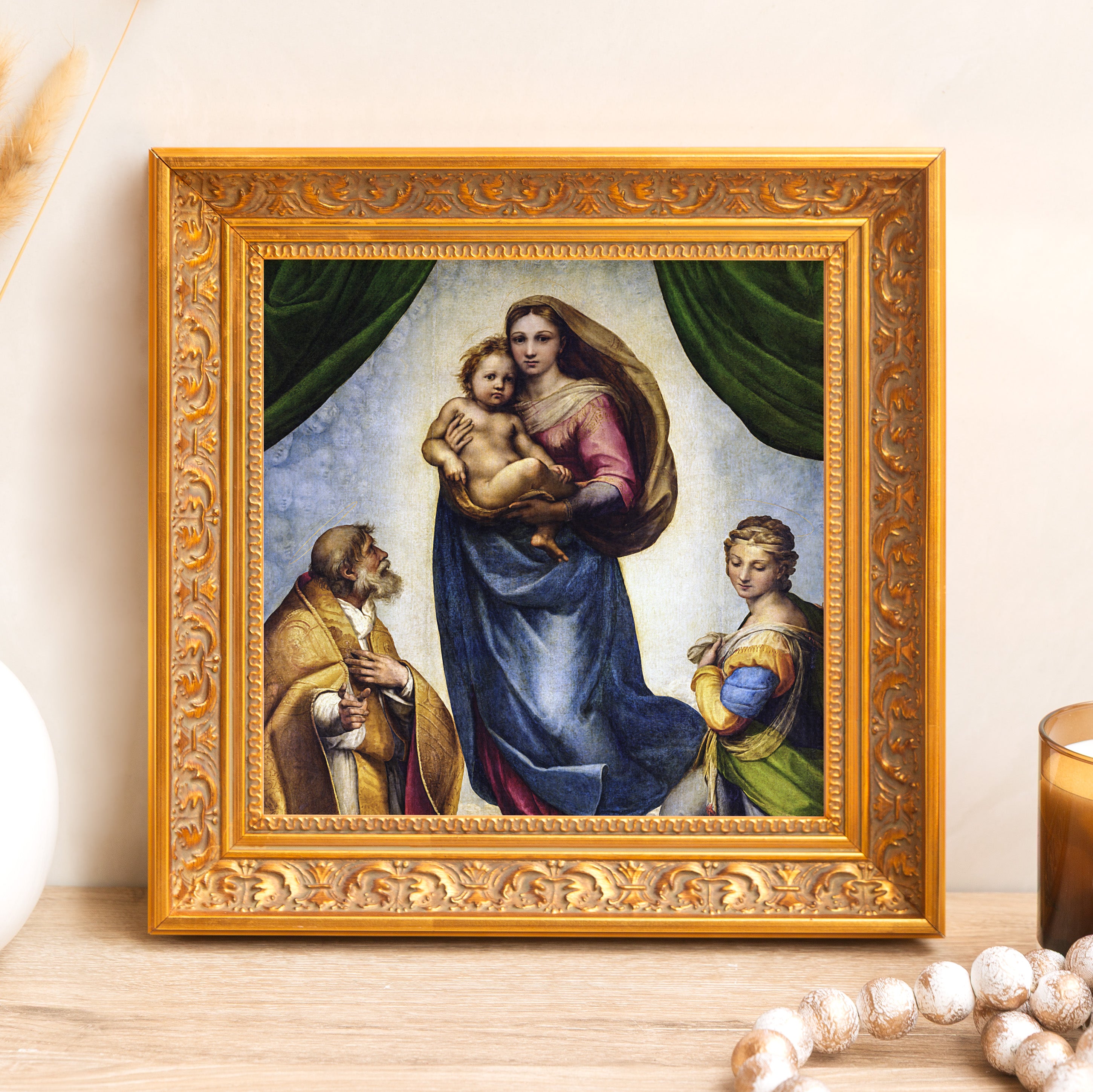 Framed painting, the Madonna del Baldacchino, in an ornate, gold frame.