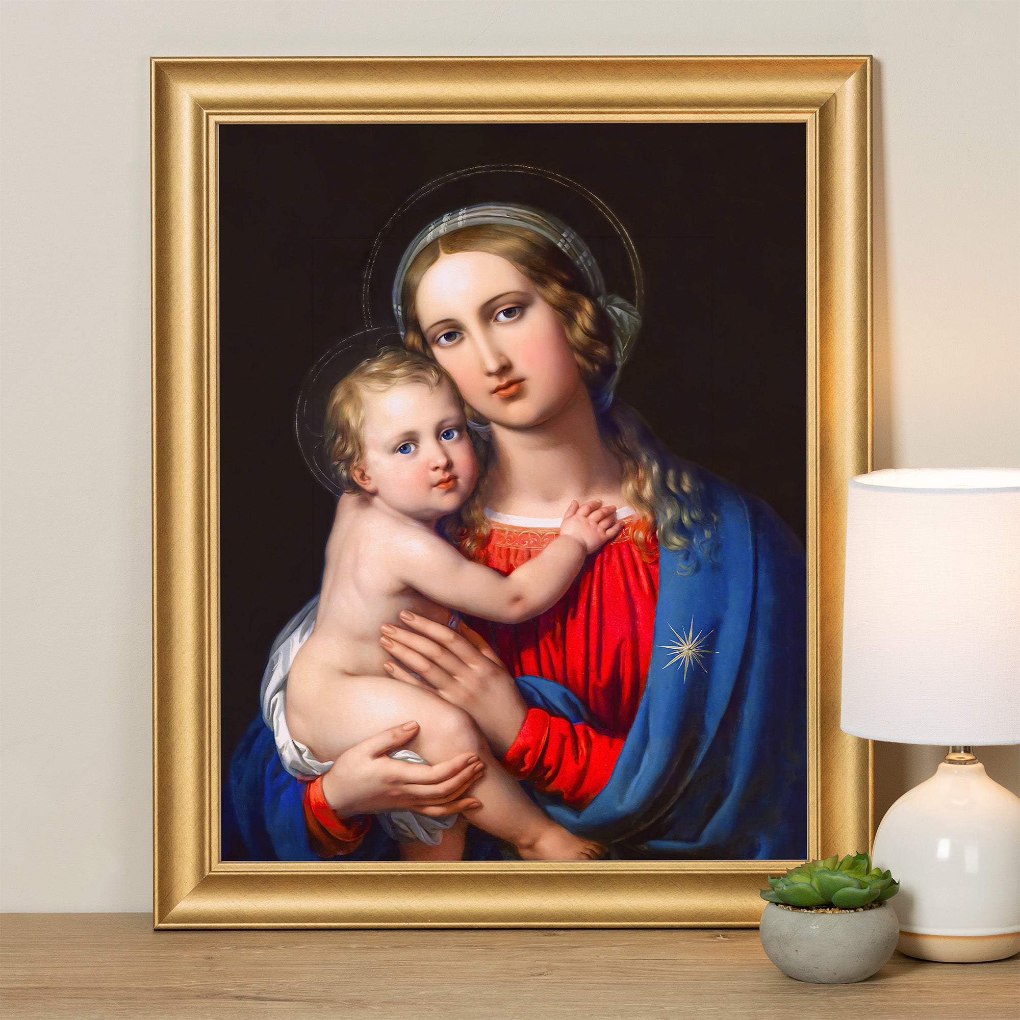 Framed Art, Virgin Mary and baby Jesus painting with a gold frame.