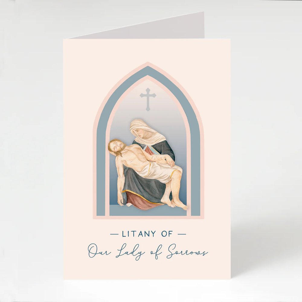 Litany of Our Lady of Sorrows card features Mary holding Jesus in an arched window with a cross above them.