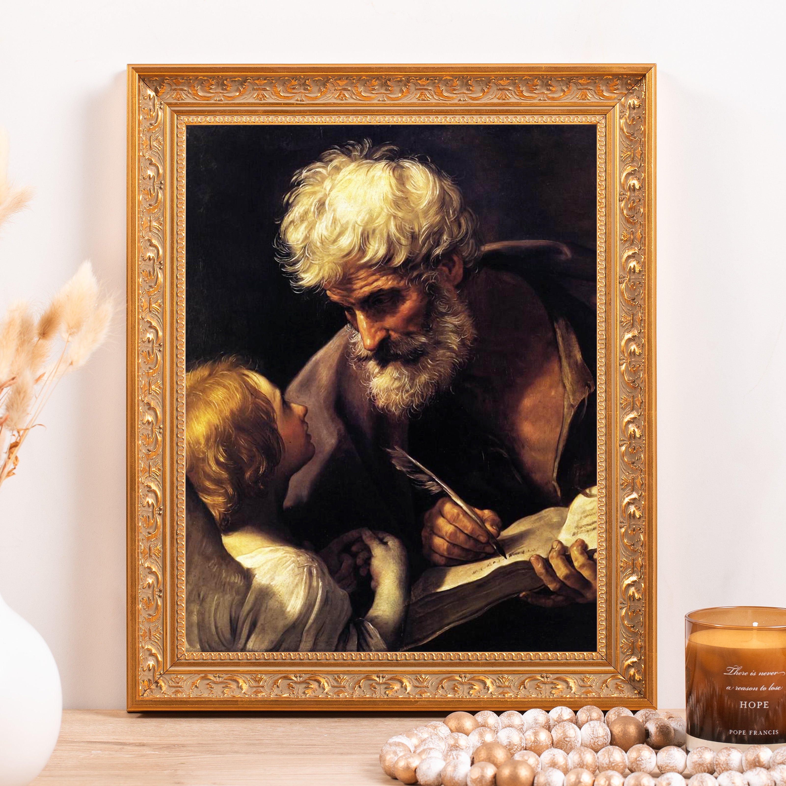 Framed "Saint Matthew and the Angel" print with an ornate gold frame, depicting a dark oil painting.