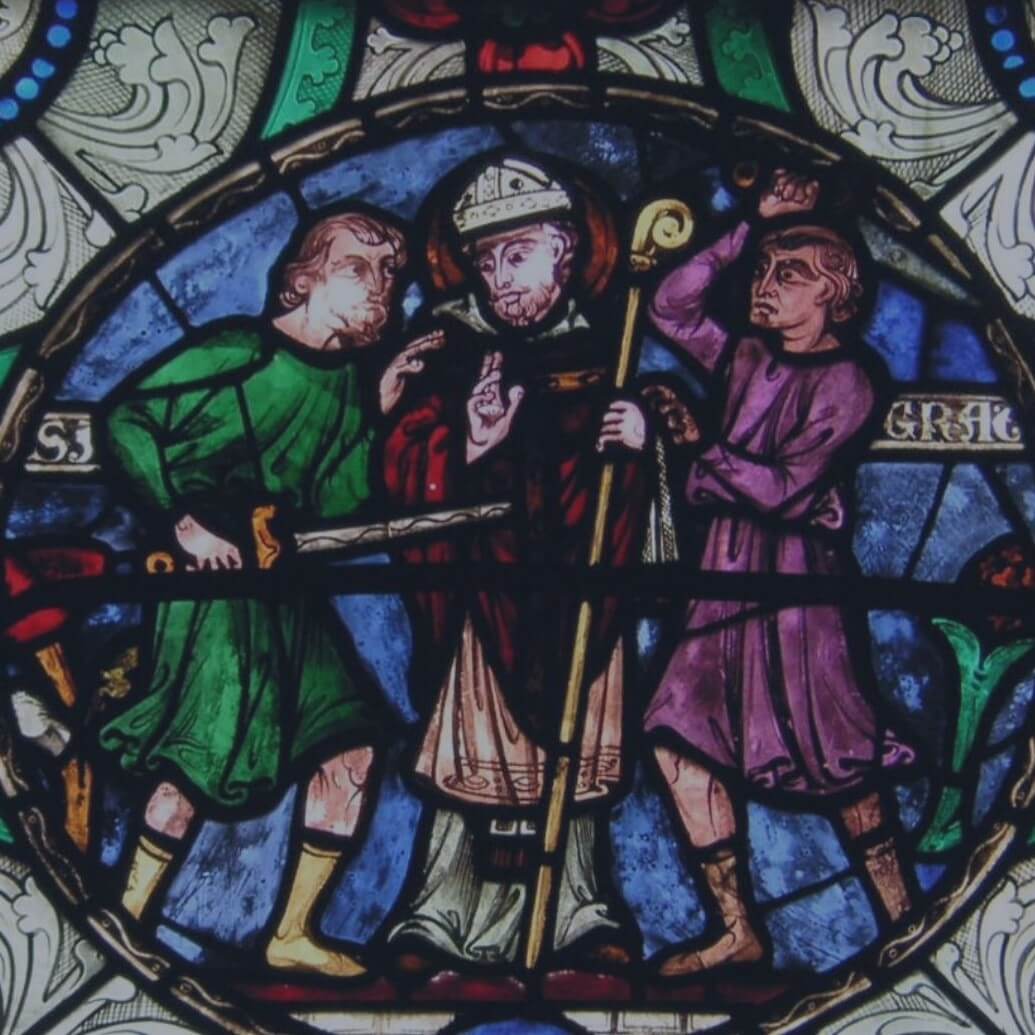 Which English bishop was martyred in his own cathedral?