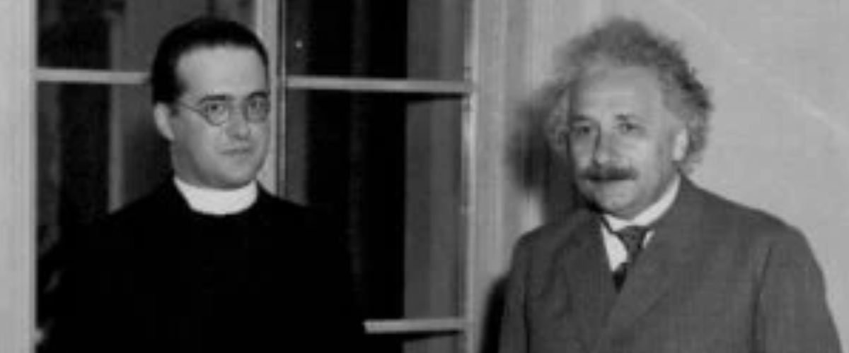 Historic photo of two men standing indoors