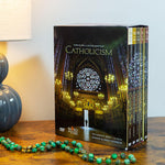 Set of Catholicism DVDs with a cathedral image on the cover, placed on a wooden surface.