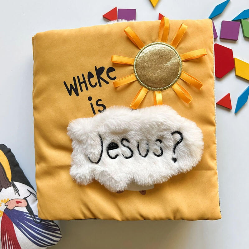 Yellow pillow covered book with sun design and 'Where is Jesus?' text on a colorful background.