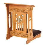 Wooden prayer kneeler with decorative patterns on a white background