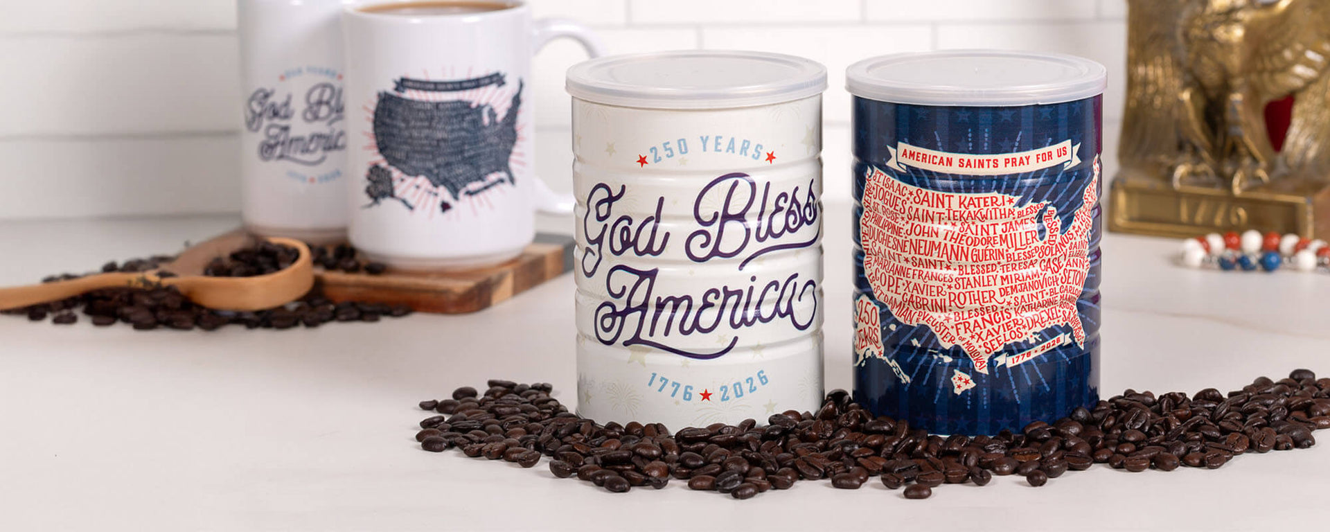 Two coffee tins with U.S. map designs and text on a surface with coffee beans.