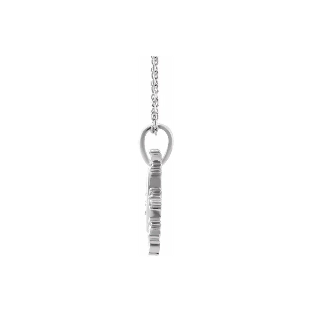 Silver, delicate snowflake pendant necklace on a chain.