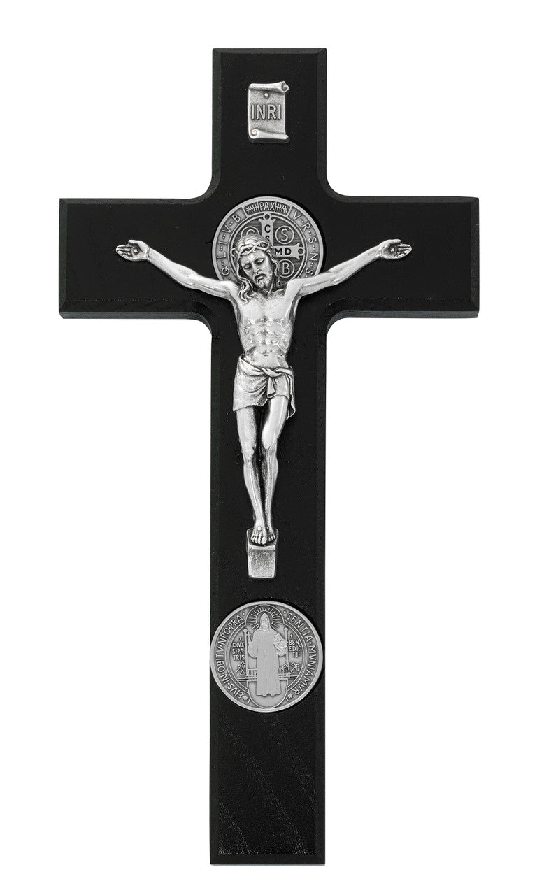 Black crucifix with a silver figure of Jesus, INRI sign, and Saint Benedict medals.
