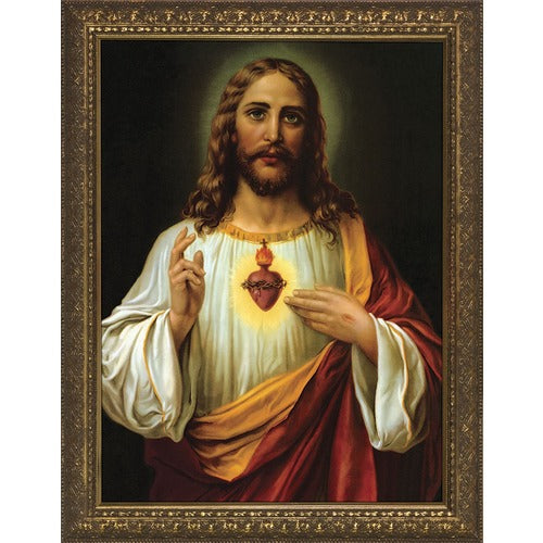 Framed Jesus portrait features a halo and the Sacred Heart in a gold decorative frame.