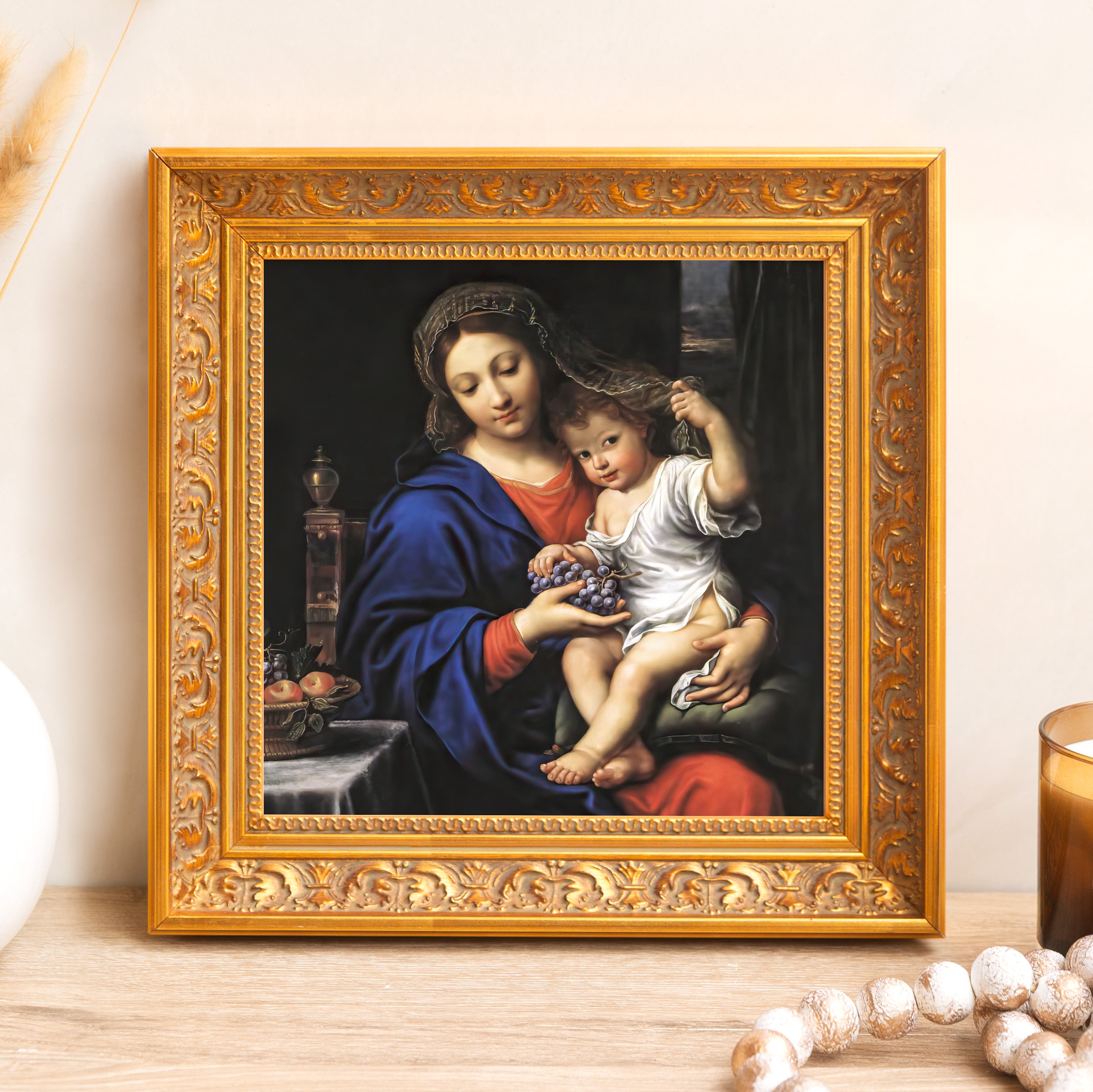 Framed print of Mary and Jesus, in a classic style with gold ornate frame.