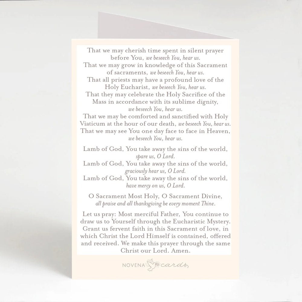 Ivory card with prayer text, used for devotional purposes, with religious imagery.