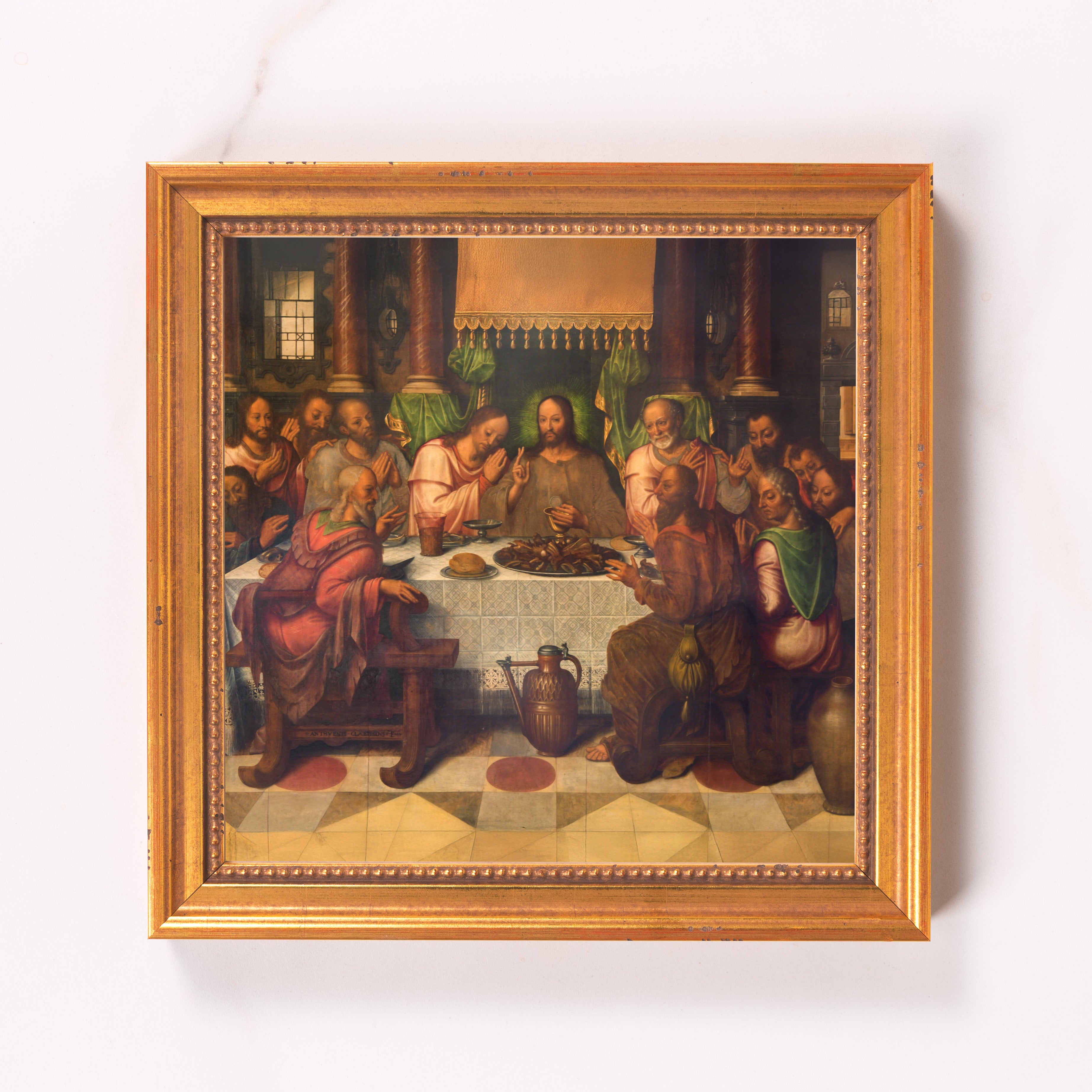 Framed "Last Supper" painting. Gold frame, religious artwork with Jesus and disciples at a table.