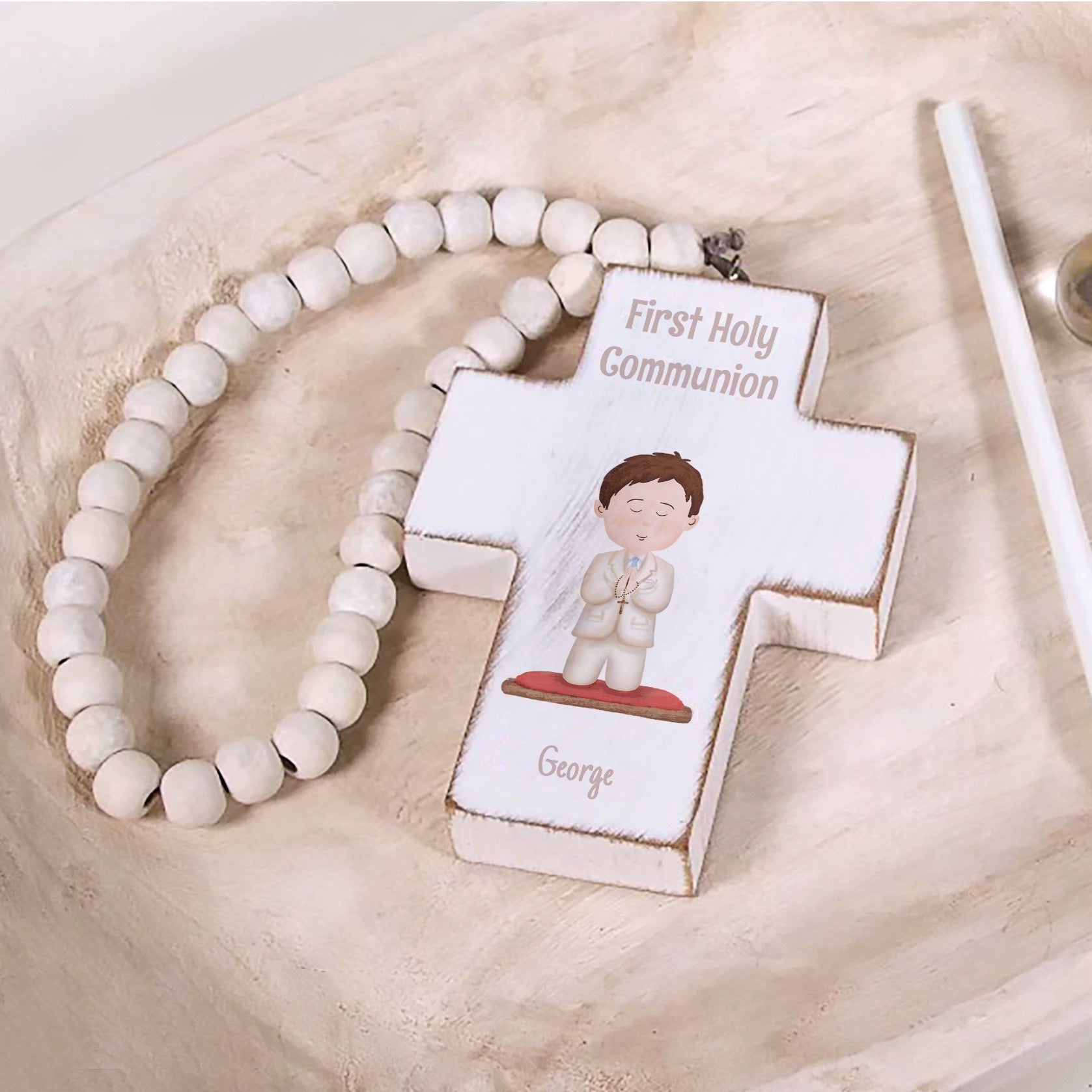 White cross ornament for First Holy Communion with wooden beads.