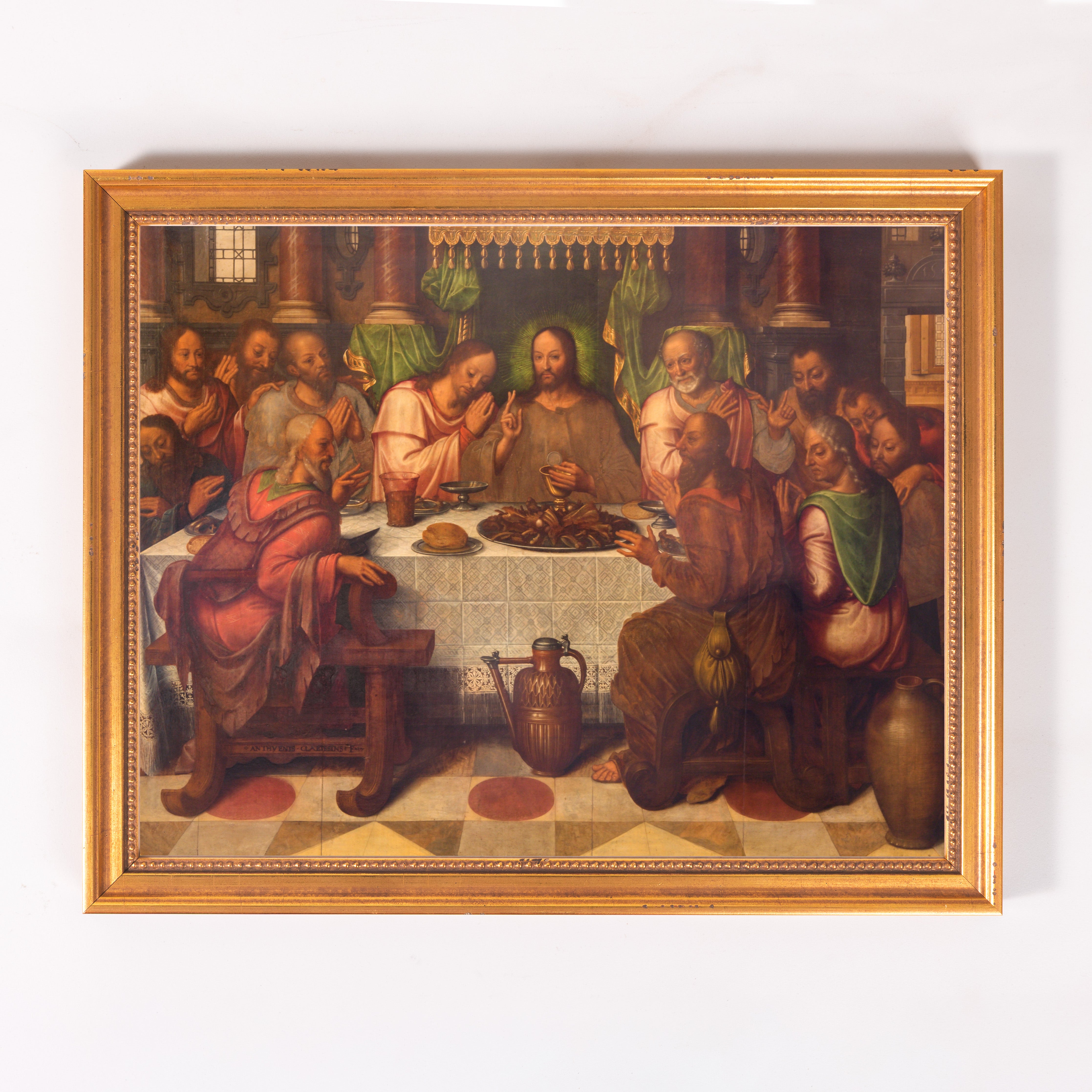 Framed painting of the Last Supper in an old master style, featuring figures at a table, in gold frame.