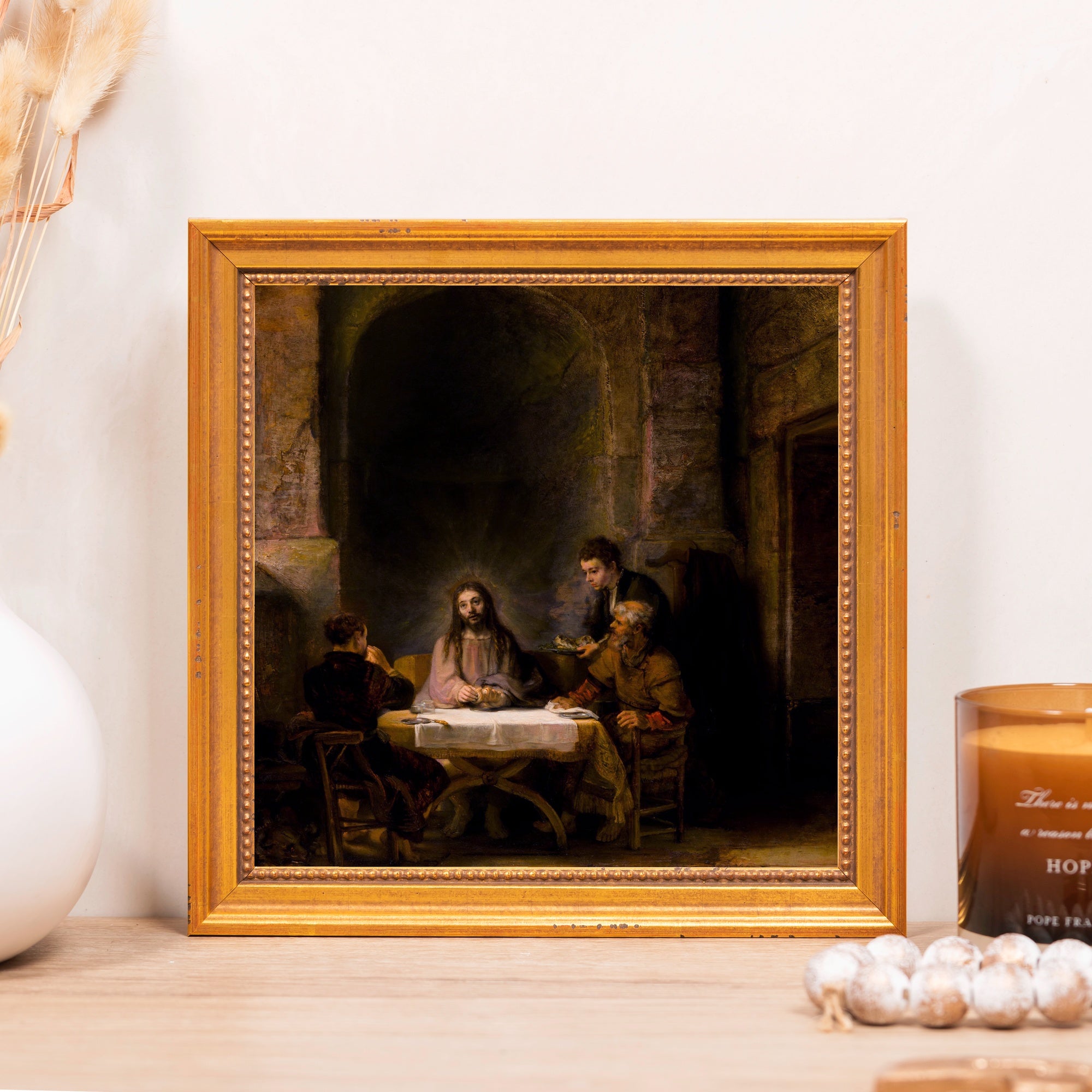 Framed painting of the Last Supper in a gold wooden frame; dark religious art print.