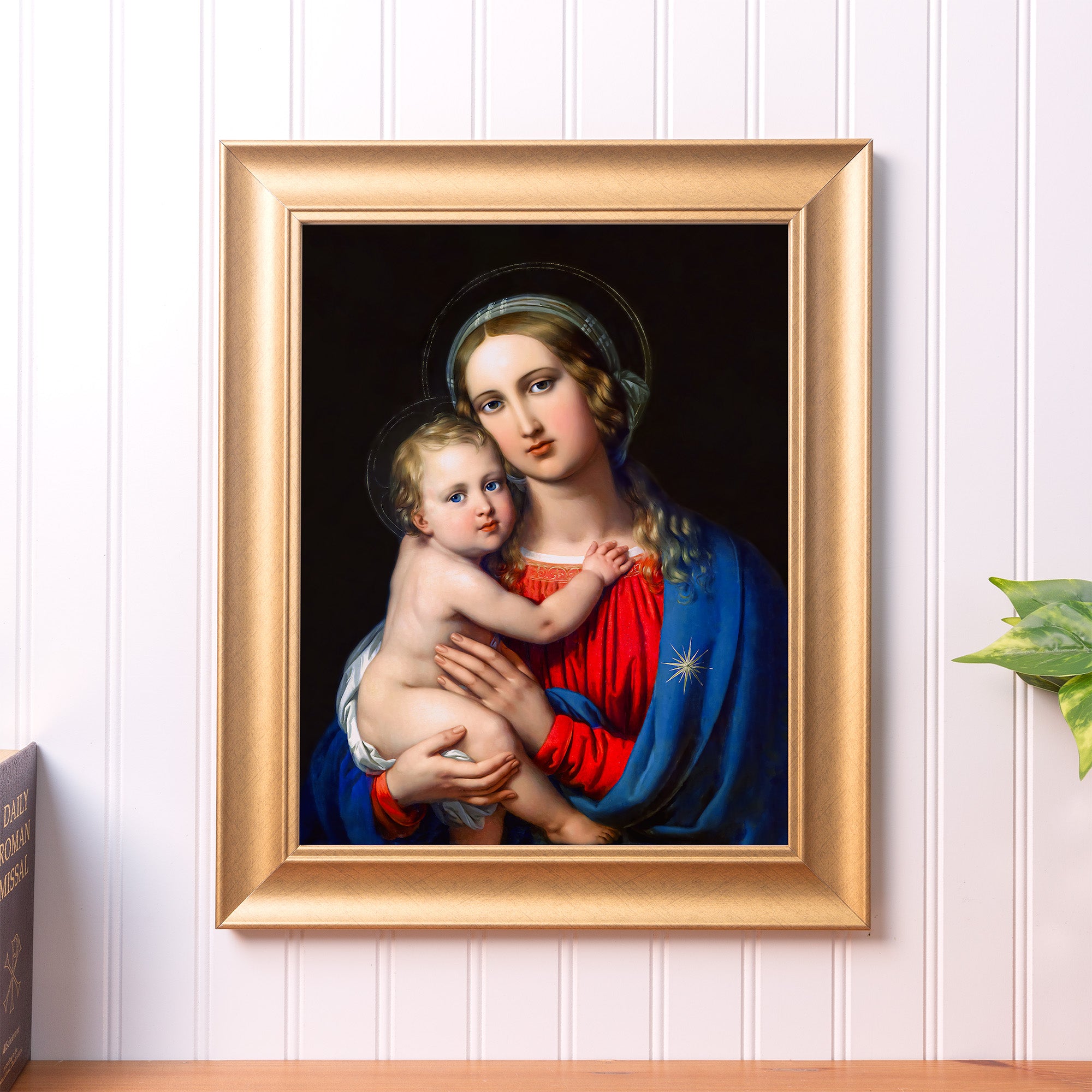 Framed Print depicting Virgin Mary and infant Jesus in a gold frame with a dark background.