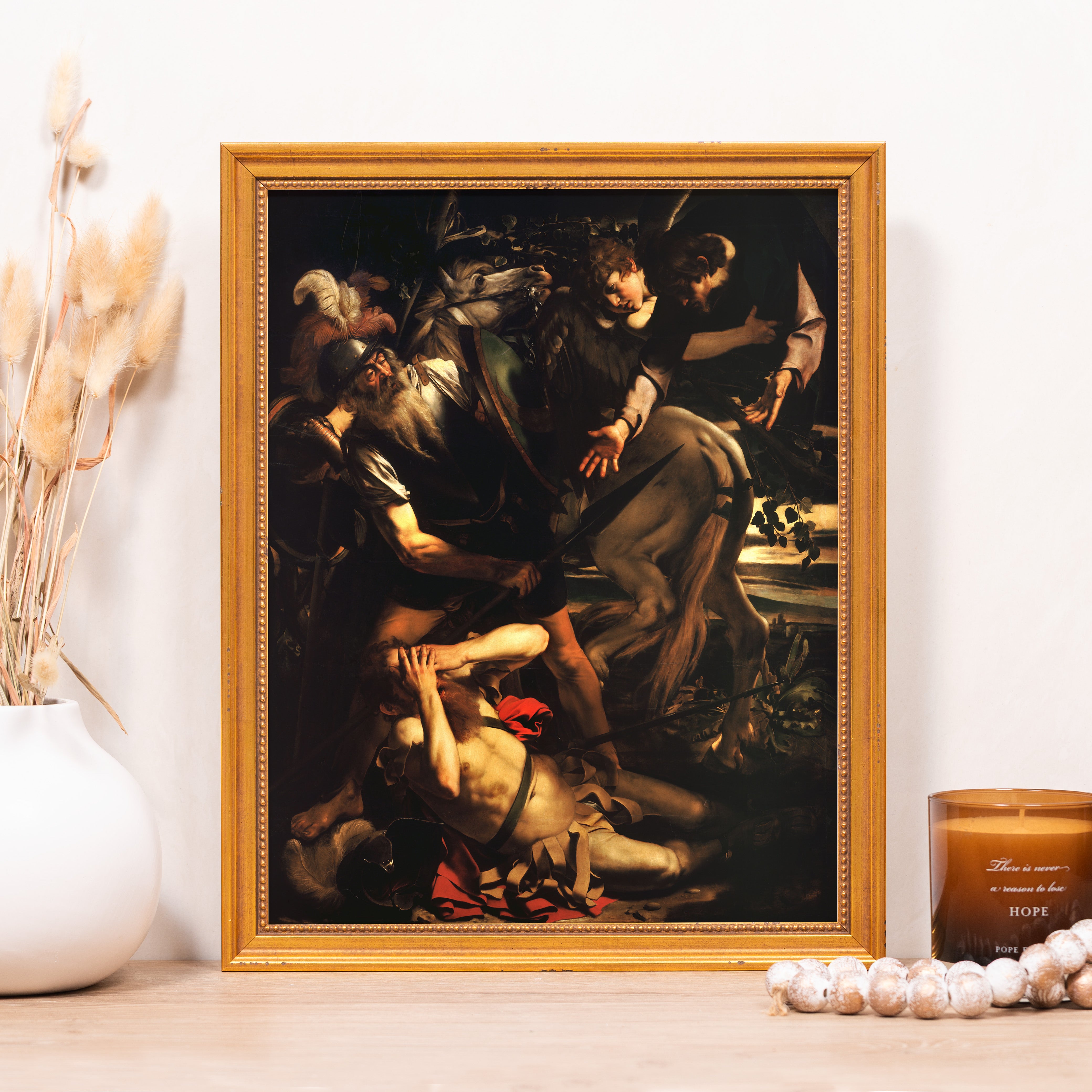 Framed print of dark renaissance-style painting with a gold frame.
