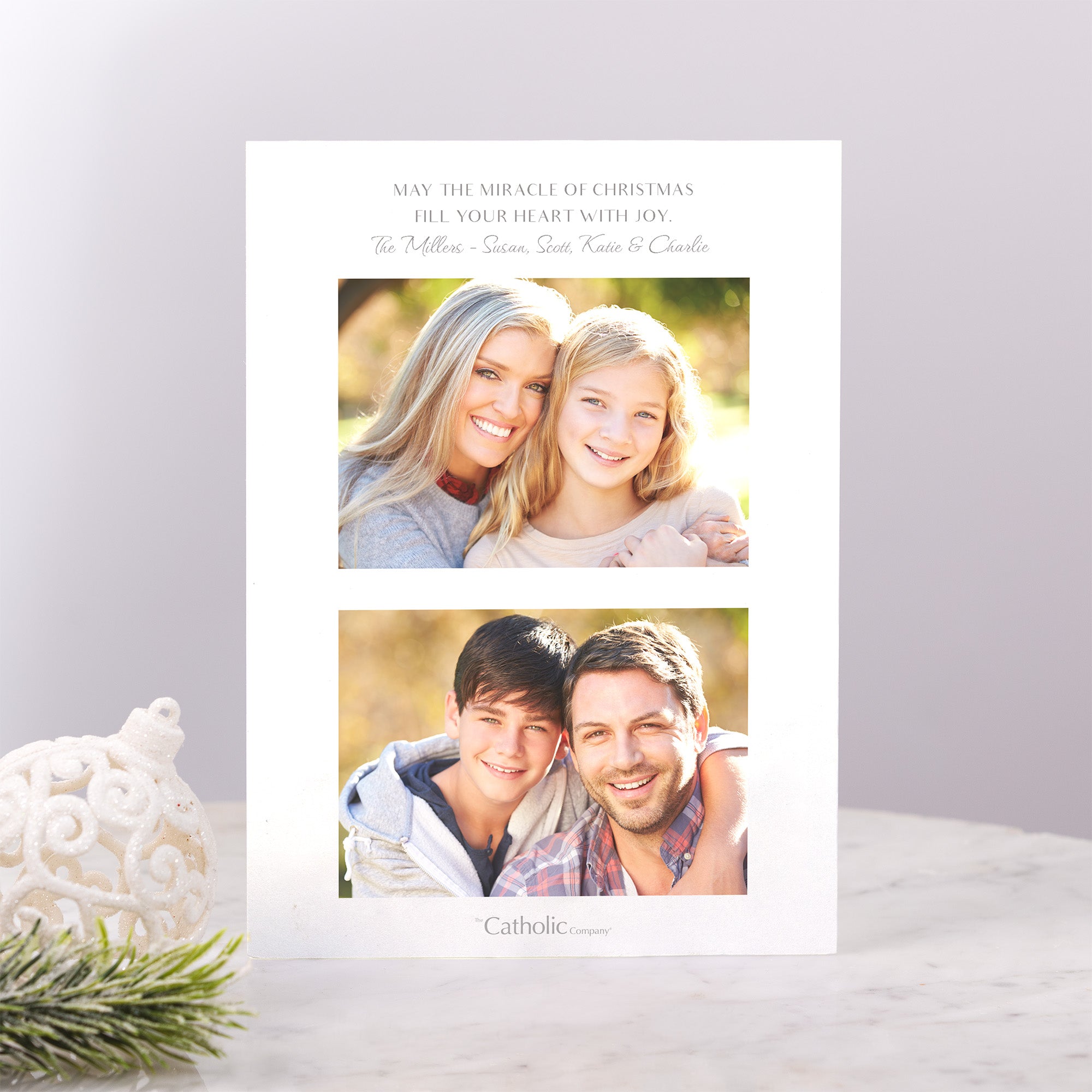 Personalized Christmas card with family photos and holiday message.