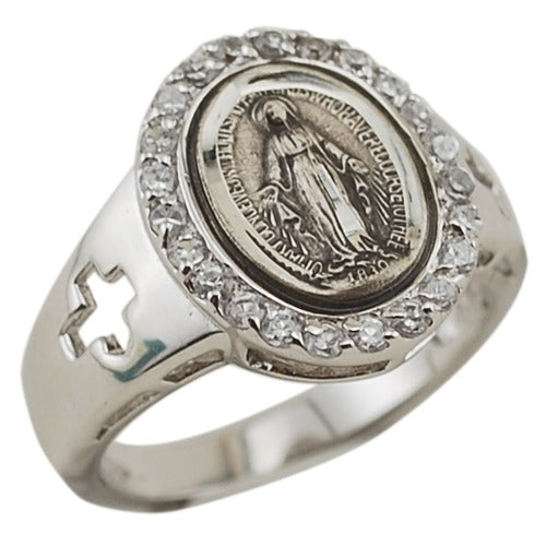 Silver ring with Virgin Mary medallion, surrounded by white gems, with cross cut-out on shank.