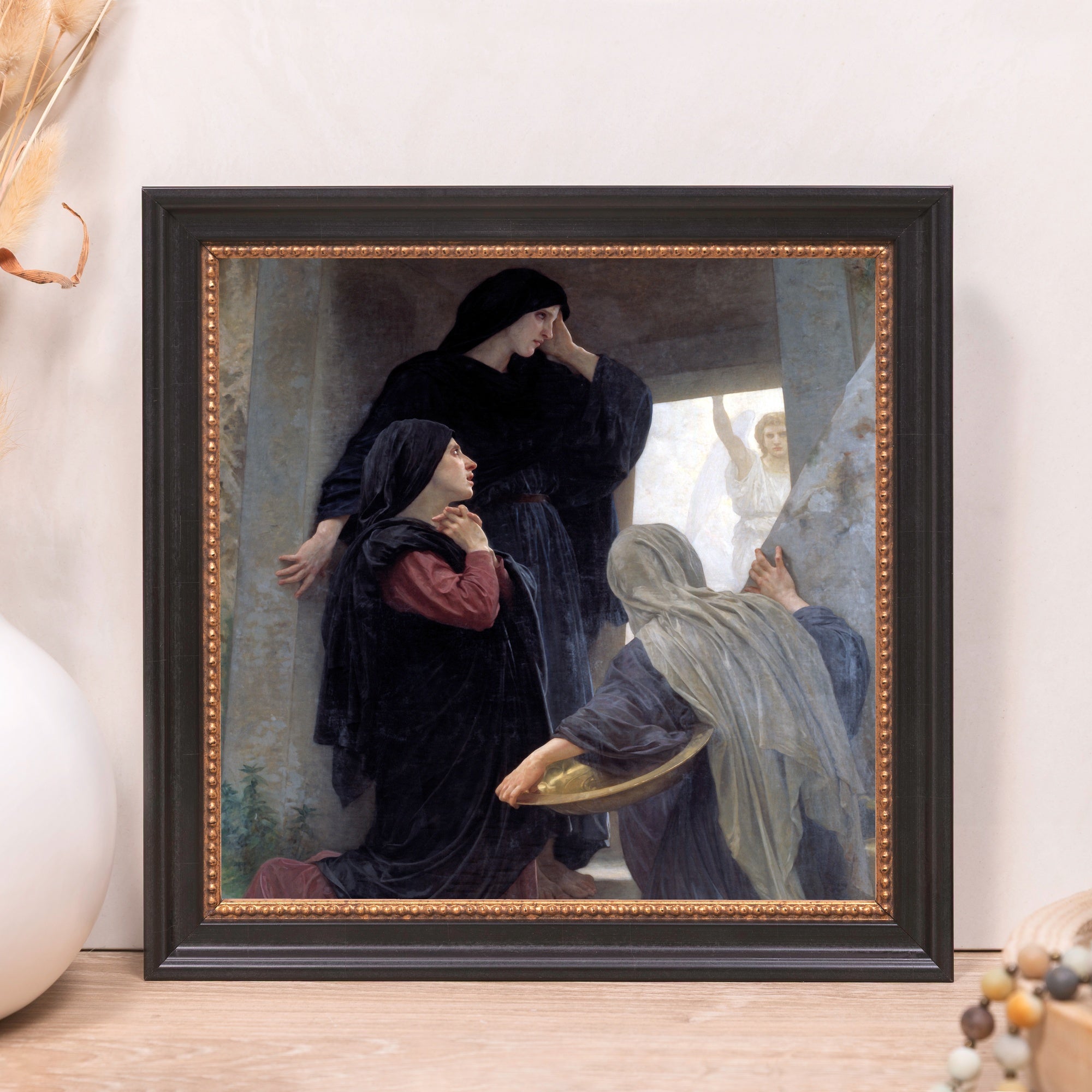 Framed print of "The Holy Women at the Sepulchre," featuring three women in mourning attire looking at an angel.