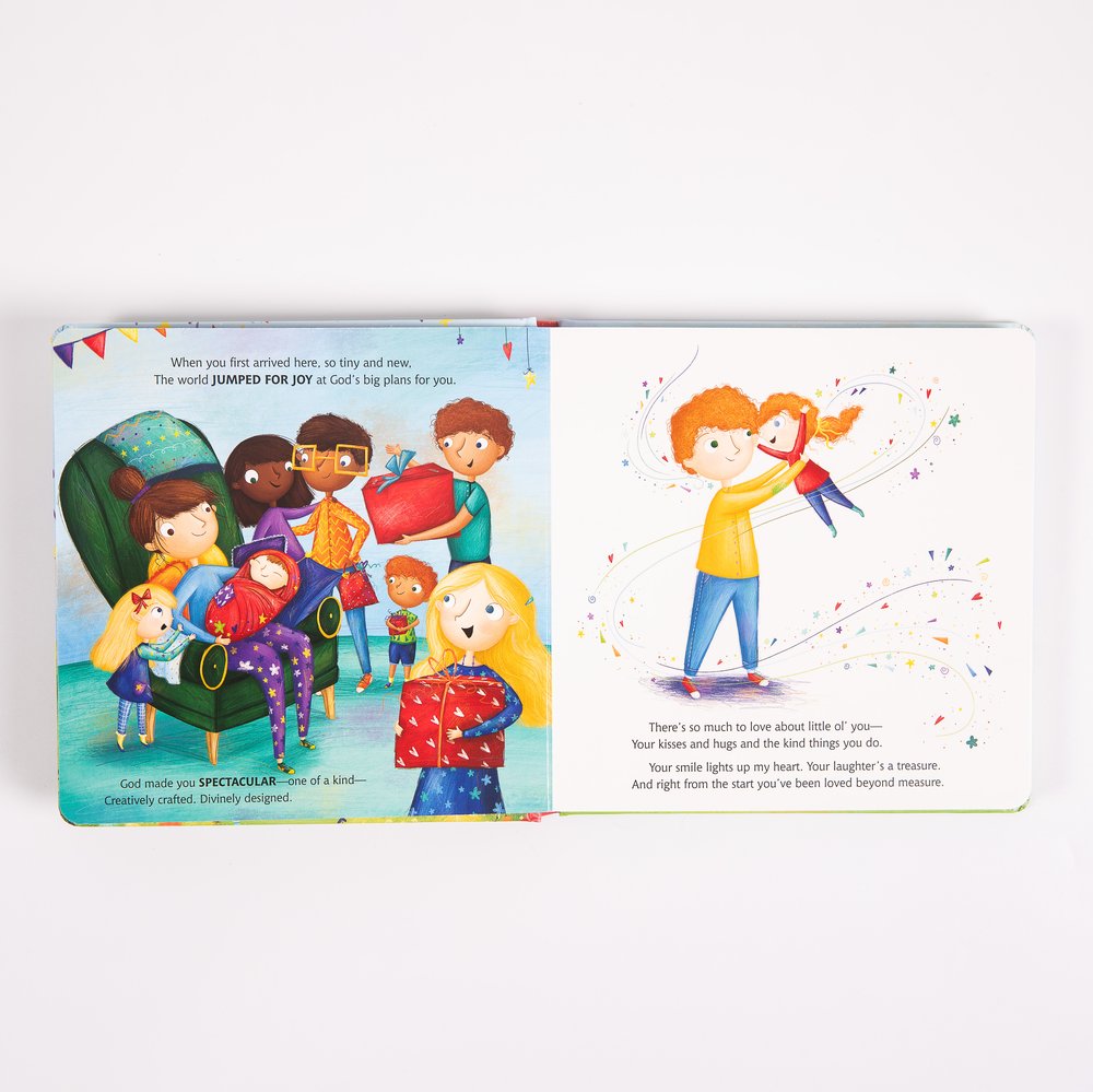 Open children's board book shows colorful cartoon illustrations and text.