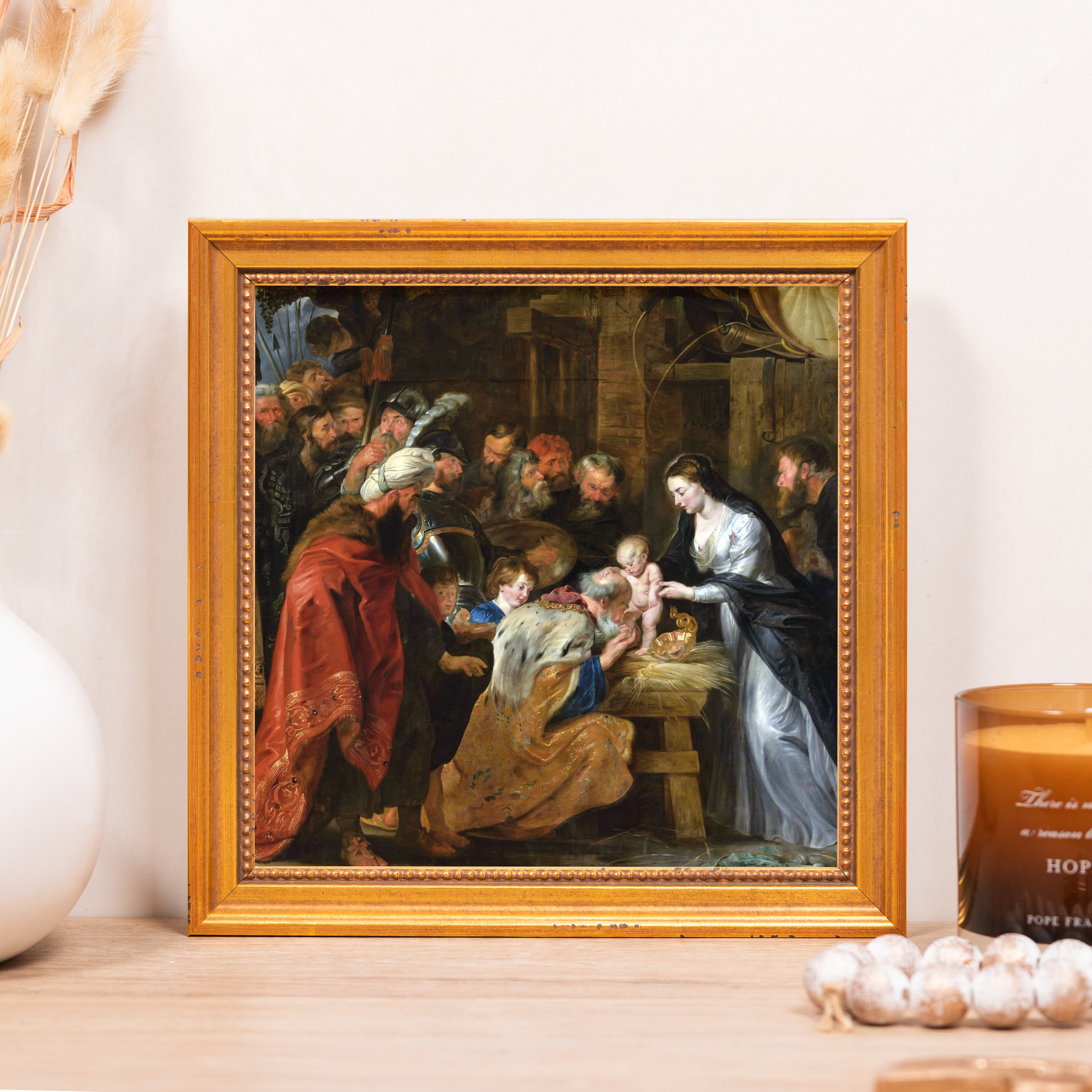 Framed painting depicting The Adoration of the Magi in a gold frame.