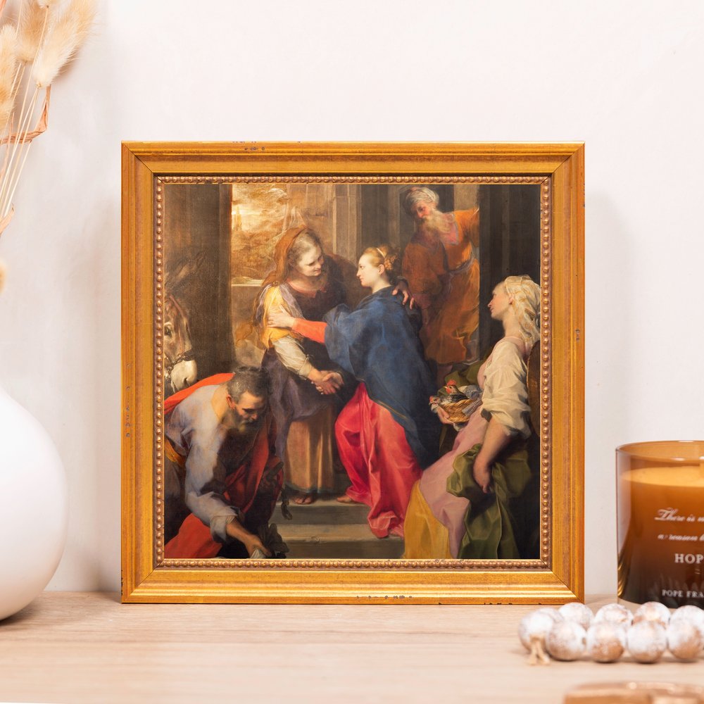 Framed "The Visitation" print; gold-colored, ornate frame surrounds a colorful Renaissance-style painting.