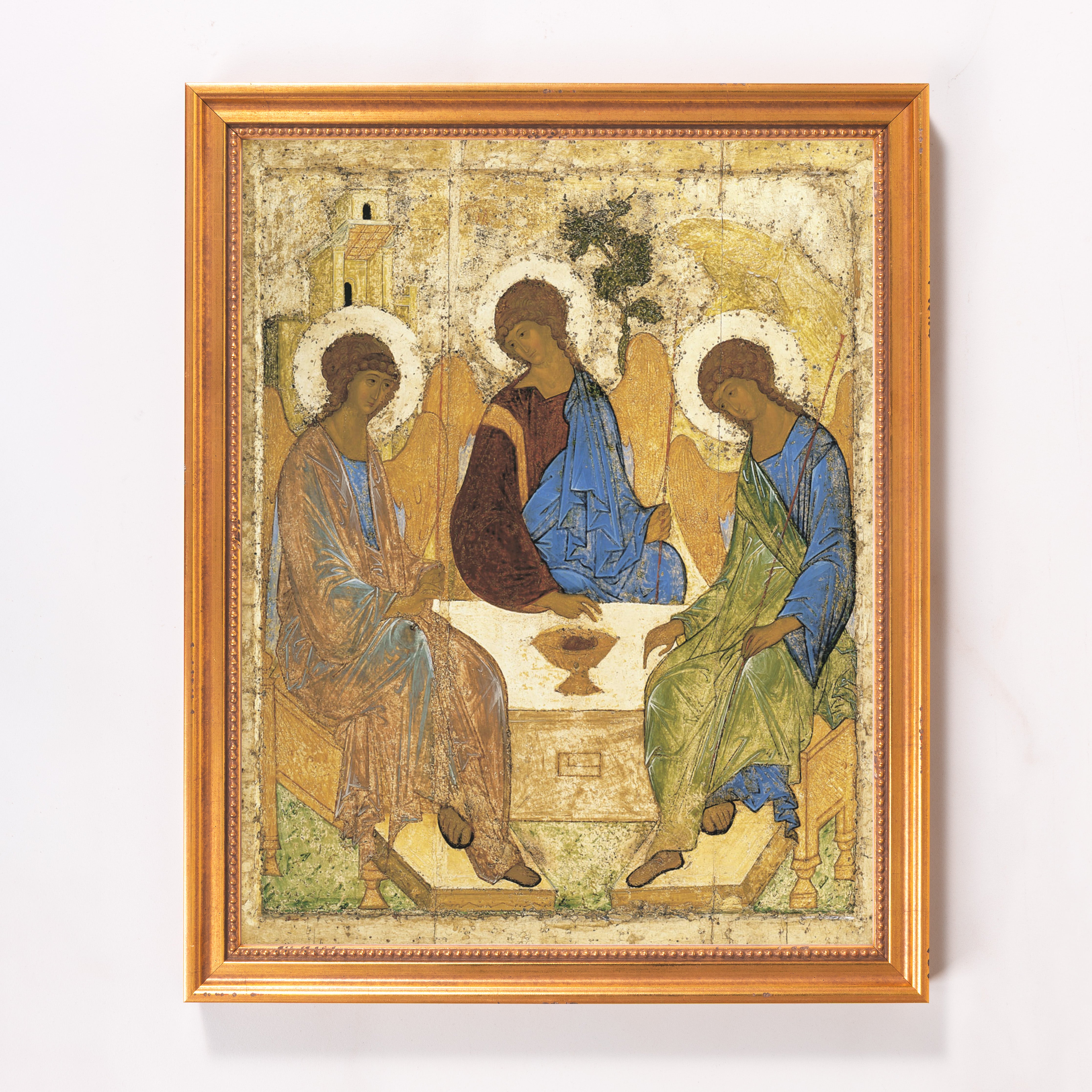 Religious Icon depicting the Holy Trinity, with gold leaf halos and frame.