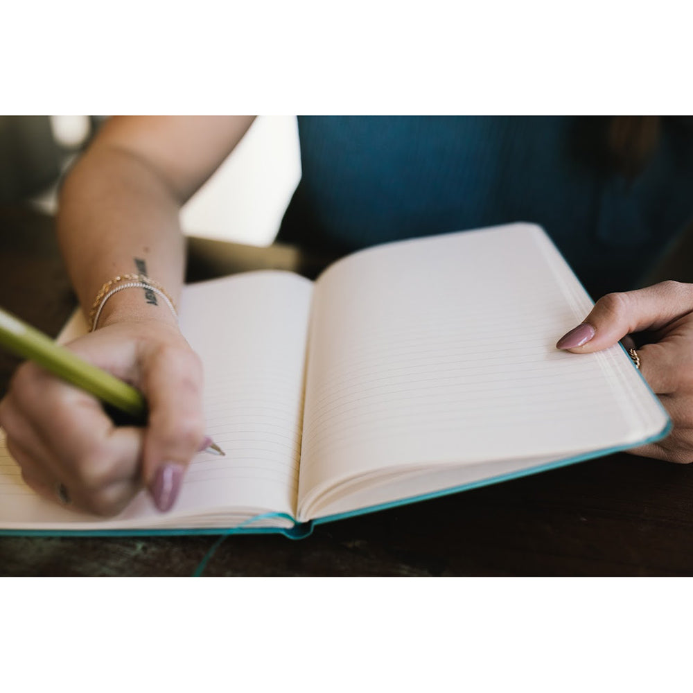 Turquoise Our Lady of Guadalupe Leatherette Journal